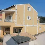 Tsoukali House